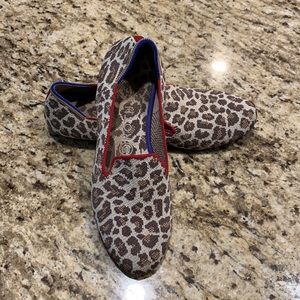 Rothy’s cheetah print loafer with red trim